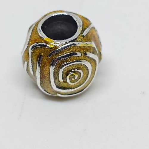 Silver charm bead with gold glitter enamel spiral design like new