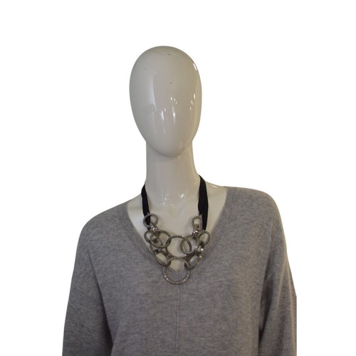 Michael Teperson necklace with black ribbon, silver tone rings and crystals used
