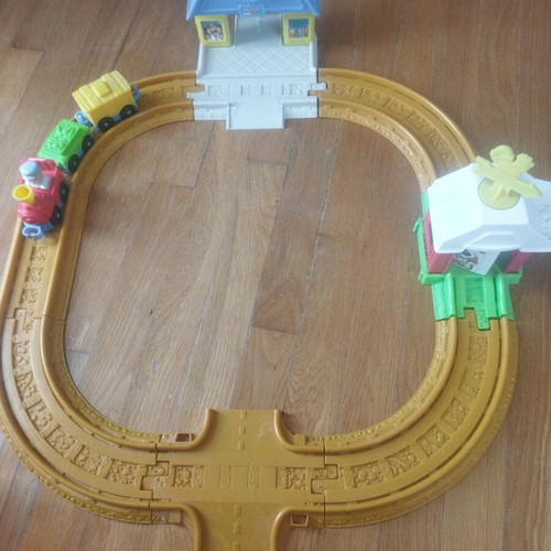 Fisher Price train used with tracks, buildings and carriages