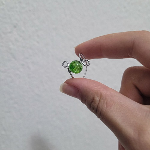 Wire ring with green glass bead handmade, like new