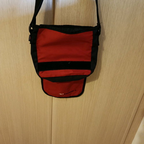 O'Neill crossbody bag used red with scratch and zipper pocket