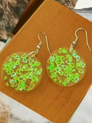 Earrings handmade from resin with steel elements made to order