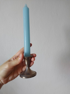 Set of silver-plated candlesticks used with candles