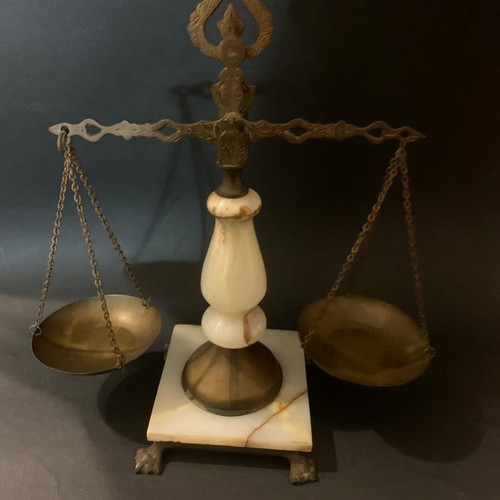 Decorative antique scale used with marble base and brass details