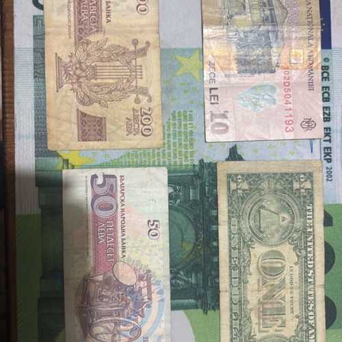 Paper money used from Romania, Bulgaria, and America