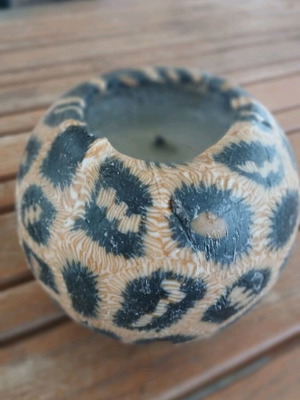 Candles like new, set of 2, 1 leopard and 1 two-tone