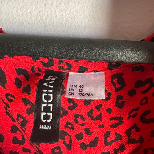 H&M one-piece shorts like new, red leopard with black, size 40