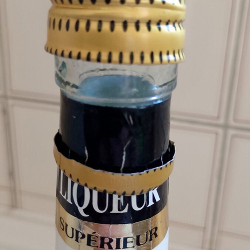 Vintage banana liqueur bottle used, empty for collection