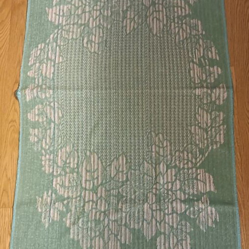 Vintage beach towel used, mint green with floral pattern