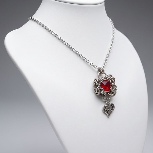 Steel necklace adjustable 40–50 cm with handmade Byzantine pendant and red stone