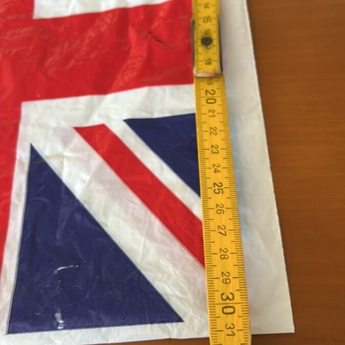 Plastic bag with English flag and small empty London bus box like new