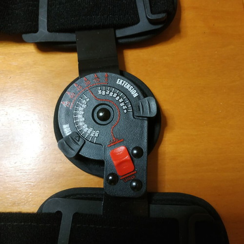 Orthopedic knee brace like new with adjustable straps and tension buttons