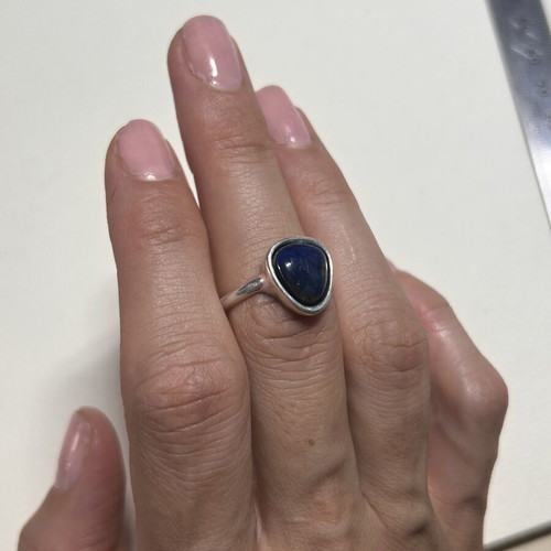 Silver ring with dark blue agate stone