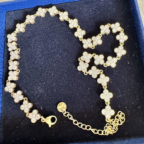 Steel necklace with zircon like new, gold color