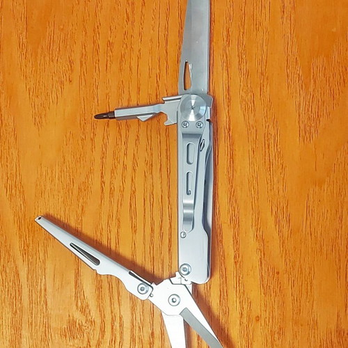 Multitool new with large scissors, knife, and double-tip screwdriver