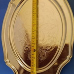 Silver-plated serving platter with embossed design, like new