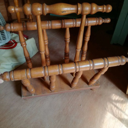 Wooden magazine rack used, carved design