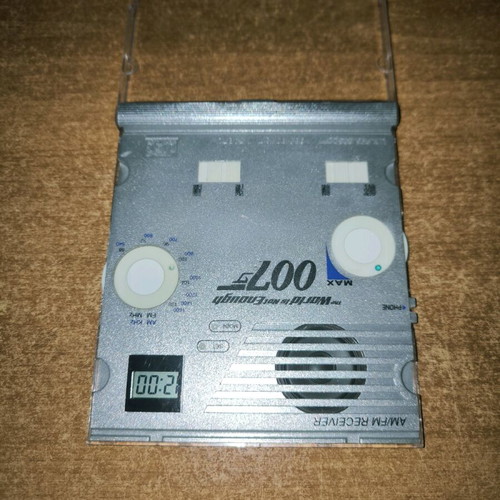 James Bond 007 AM FM radio with clock in like new condition, retro vintage