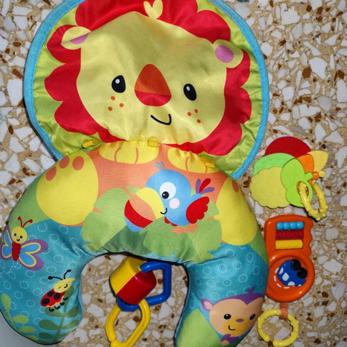 Activity Pillow for Babies like new with hanging toys