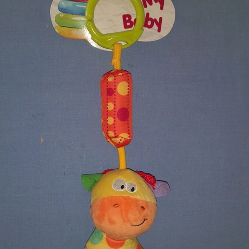 Hanging giraffe toy new with sound and teether