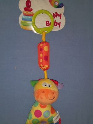 Hanging giraffe toy new with sound and teether
