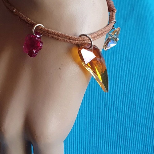Adjustable bracelet used with brown and multicolor crystals