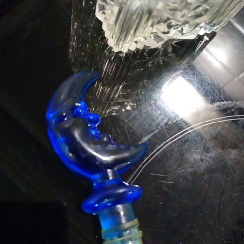 Crystal carafe like new with blue crescent moon lid
