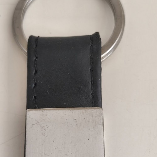 Calvin Klein leather keychain like new with steel details and embossed logo