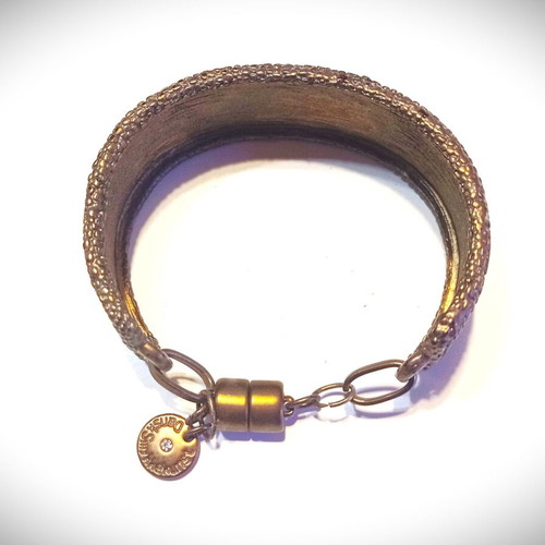 Bronze bracelet with magnetic clasp like new, embossed surface