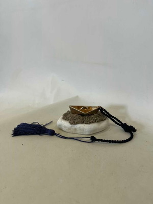 Handmade table charm with bronze boat and marble stone