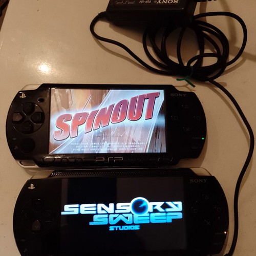 PlayStation Portable (PSP) used, 2 devices with original charger