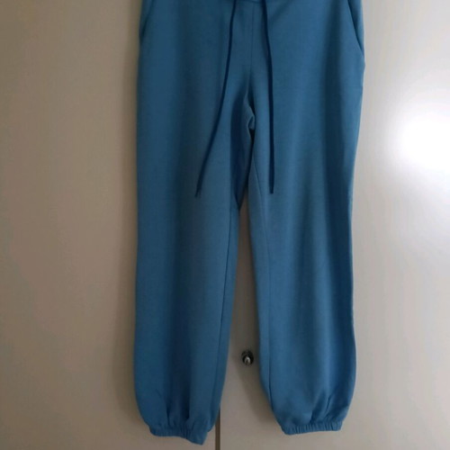 Tracksuit like new in bright blue with strass logo, size L