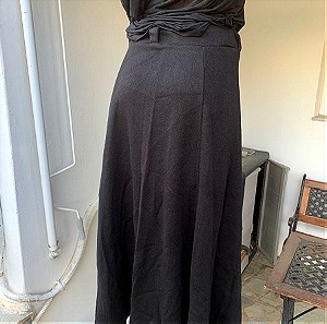 Μαύρη μάλλινη φούστα κλος, μέση μέχρι 56εκ με λάστιχο και θυλάκια για ζώνη, μάκρος 86εκ, 5 ευρώ
