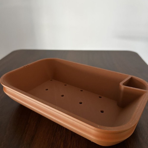 Plastic planter like new with automatic watering feature, size 12x20x5 cm