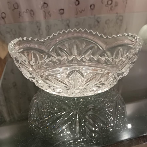 Crystal centerpiece bowl vintage with carved designs and scalloped edge