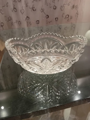 Crystal centerpiece bowl vintage with carved designs and scalloped edge