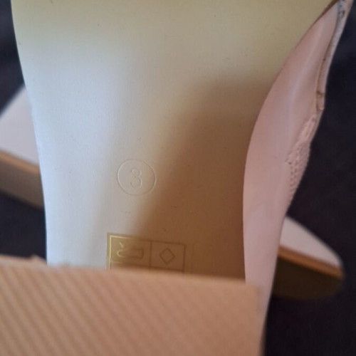 Patent leather boots new with slight defects, size 36, white