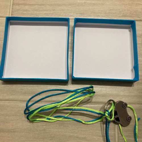 Gift box new with ribbon and car keychain