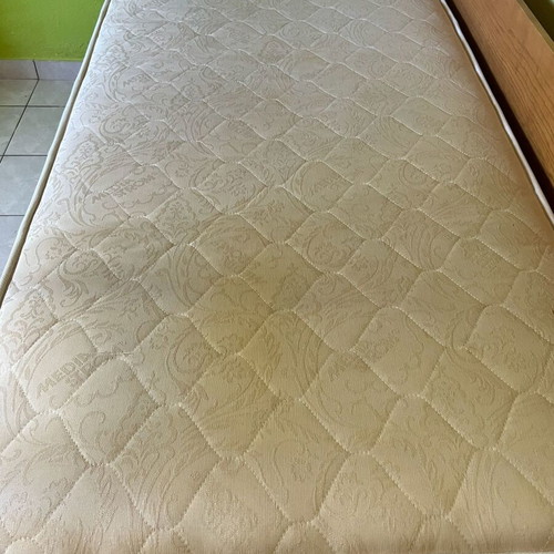 Wooden bunk bed with third sliding bed and mattresses like new