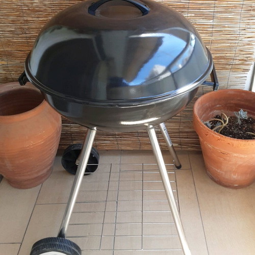 Bormann Charcoal Grill used with wheels and shelf