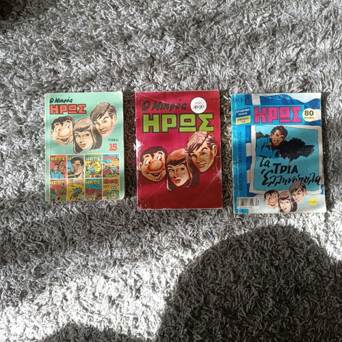 Mikros Iroas comics with worn covers
