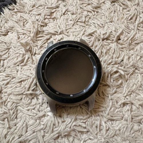 Samsung Galaxy Watch 46mm used with charger and 4 straps