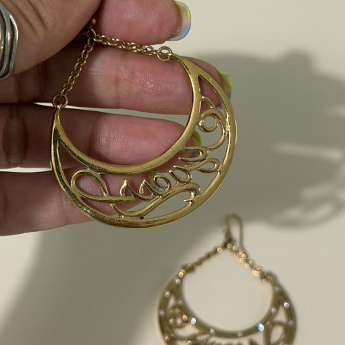 Guess goldtone dangling earrings with rhinestones