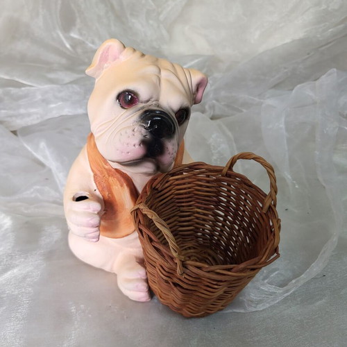 Decorative dog figure with basket