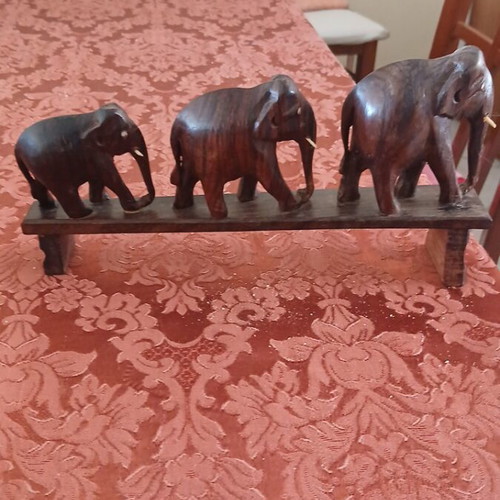 Wooden elephant set on base, like new, three sizes, handmade