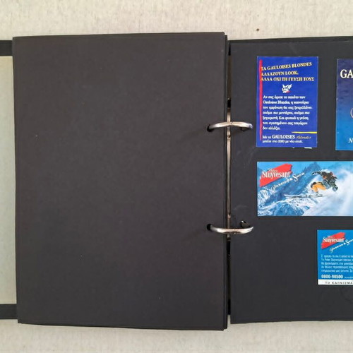 103 Cartoons by Kyr and 8 Cigarette Papers in Folder used