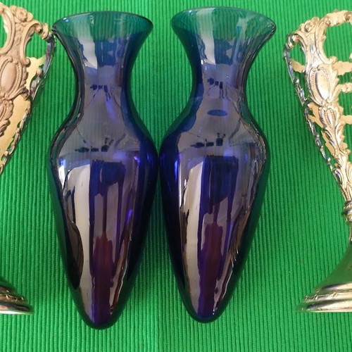 Pair of cobalt glass vases used with silver bases