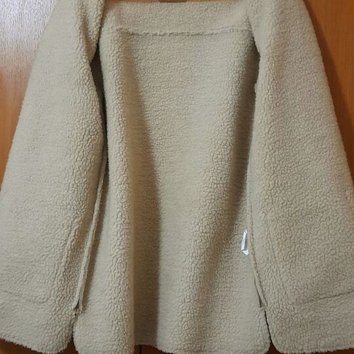 Atmosphere beige coat like new with synthetic fur lining