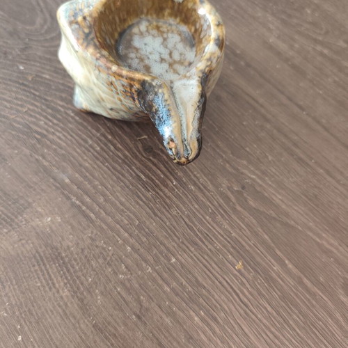 Ceramic ashtray in shell shape used