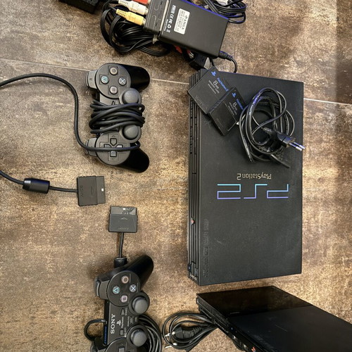 PlayStation 2 retro bundle with 2 consoles, controllers, memory cards, HDMI adapter like new